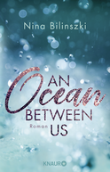 Buchcover von An Ocean Between Us: Roman von Nina Bilinszki