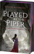 Buchcover von Played by the Piper − Die Unbeugsame von Raven Kennedy